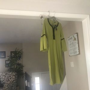 Green 3/4 sleeve dress with tag. Black trim